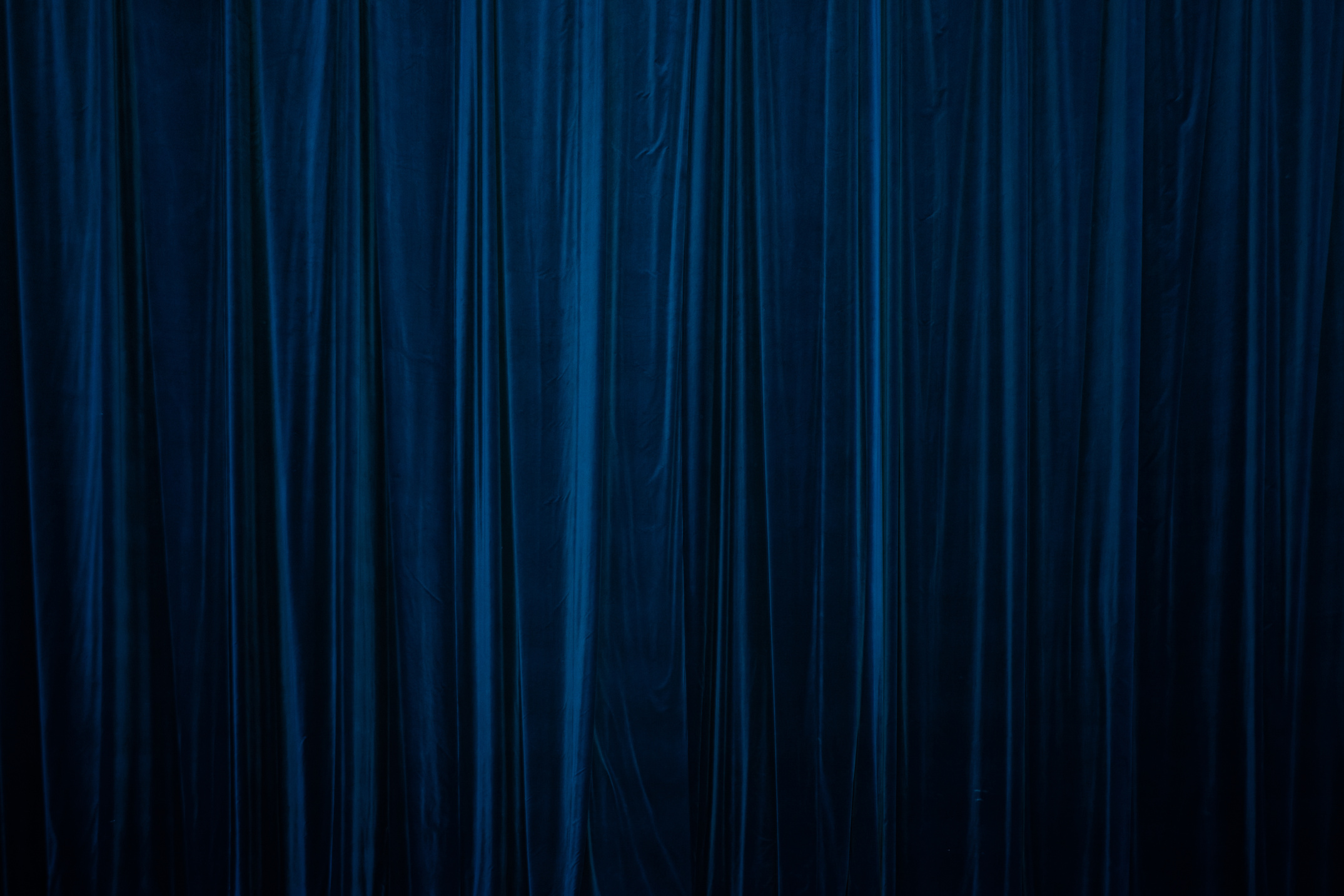 blue curtain in theatre